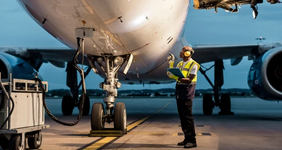 Engineer inspecting a plane