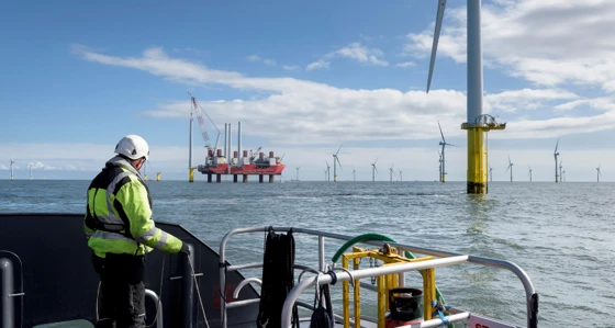 Worker near an offshore wind farm