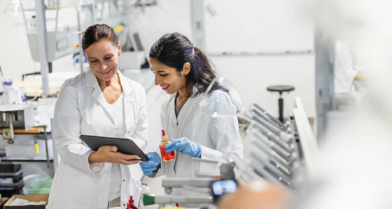 Two people in lab coats