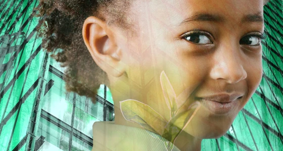 A young girl and leaf with city and trees background