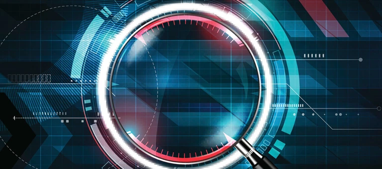 A close-up of a camera lens surrounded by colourful graphics