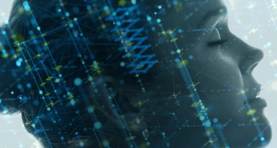 Blue silhouette of a woman's head with digital graphics overlay