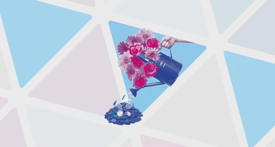 Hand holding a watering can full of flowers and coins