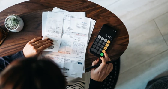 Woman looking at her bills