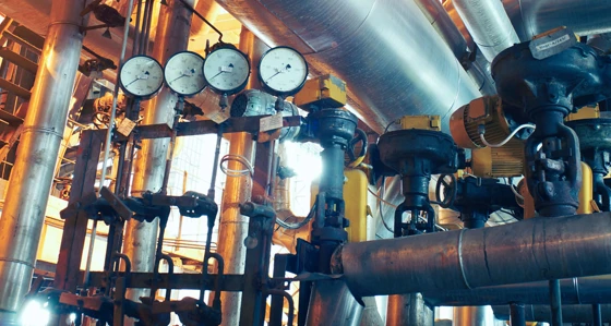 Pressure gauges and pipes inside a factory